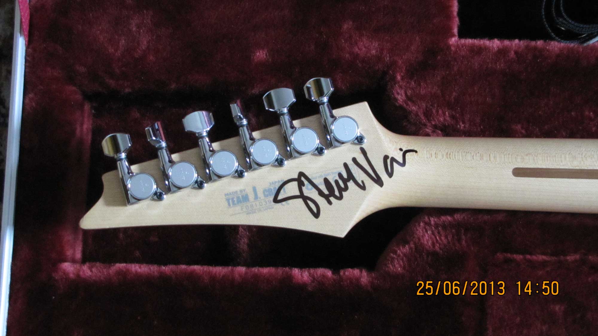 JS1200 headstock signed by Steve Vai.